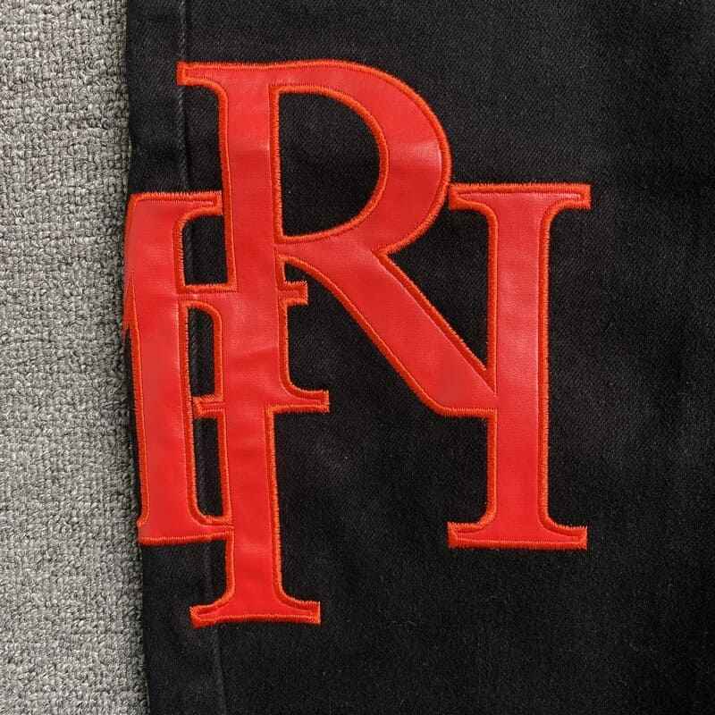 Amiri Black Staggered Logo Jeans