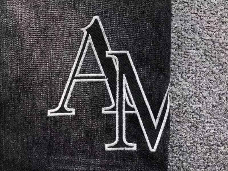 Amiri Black Patch Jeans