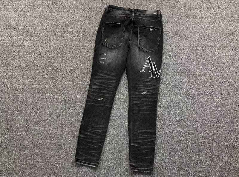 Amiri Black Patch Jeans