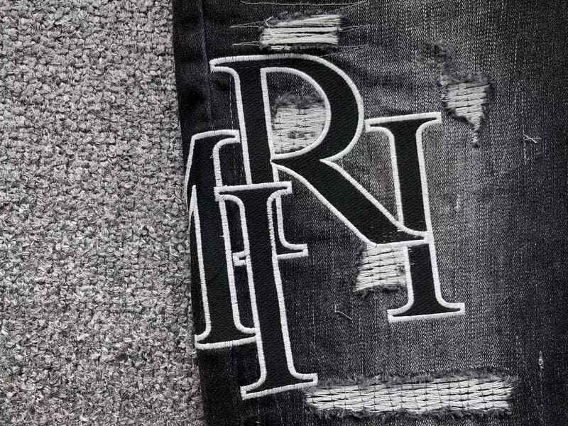 Amiri Black Patch Jeans